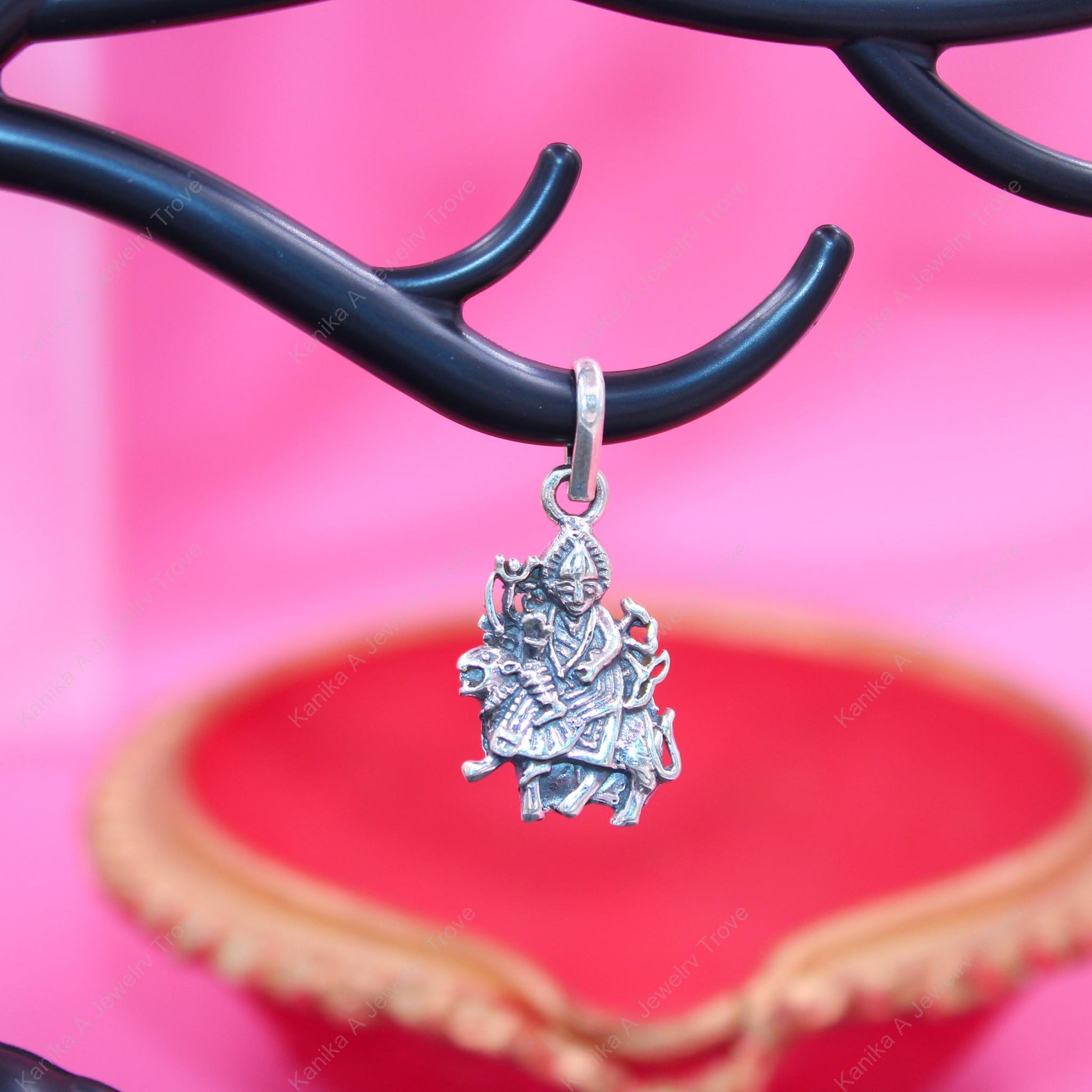 Elegant silver pendant with goddess motif on chain