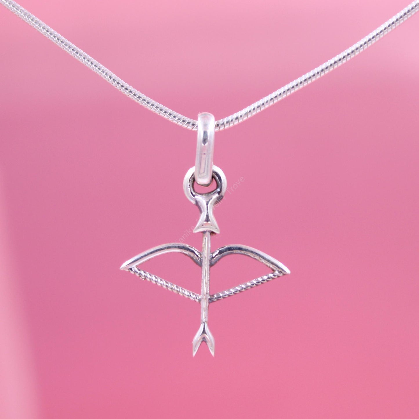 Elegant silver archery pendant necklace