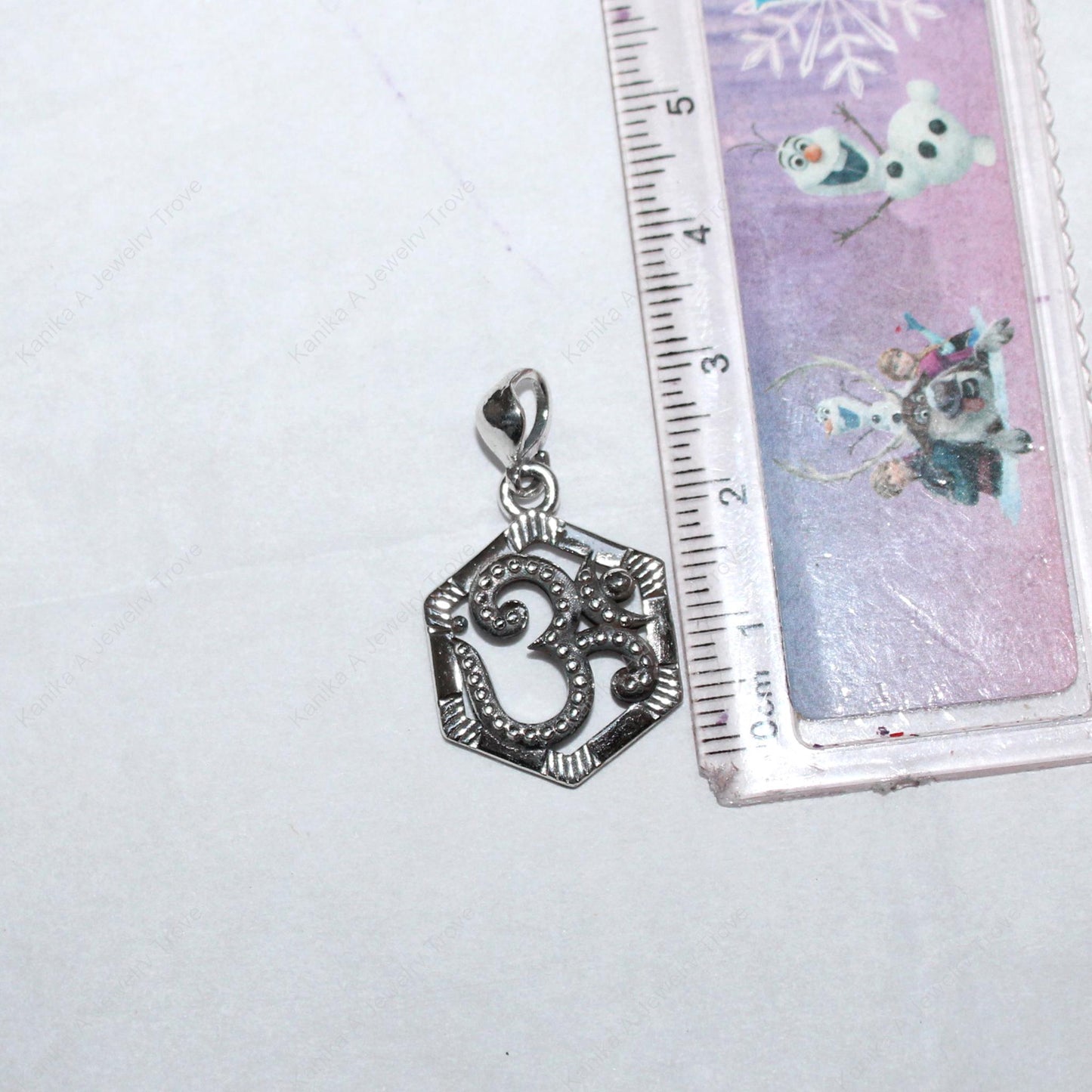 Hexagon charm with Om symbol on silver chain