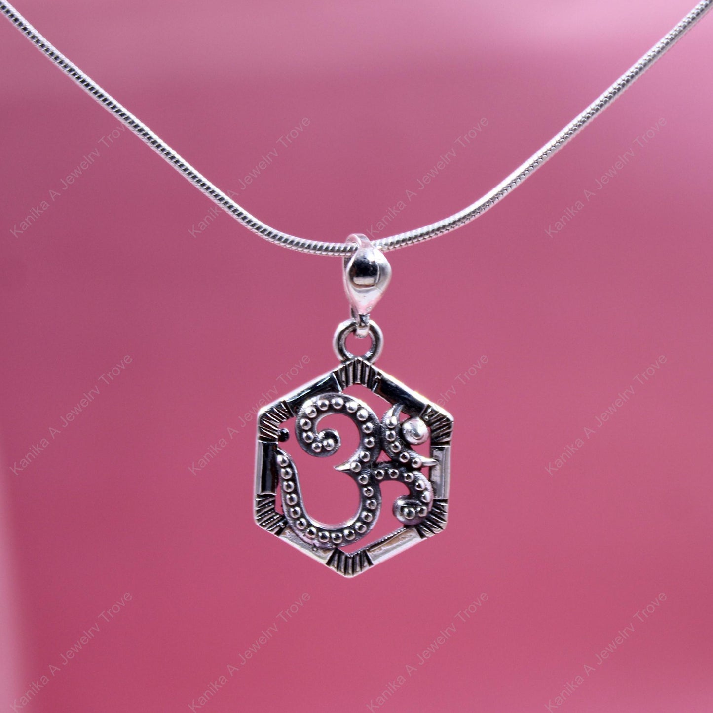 Elegant silver necklace with Om for mindfulness