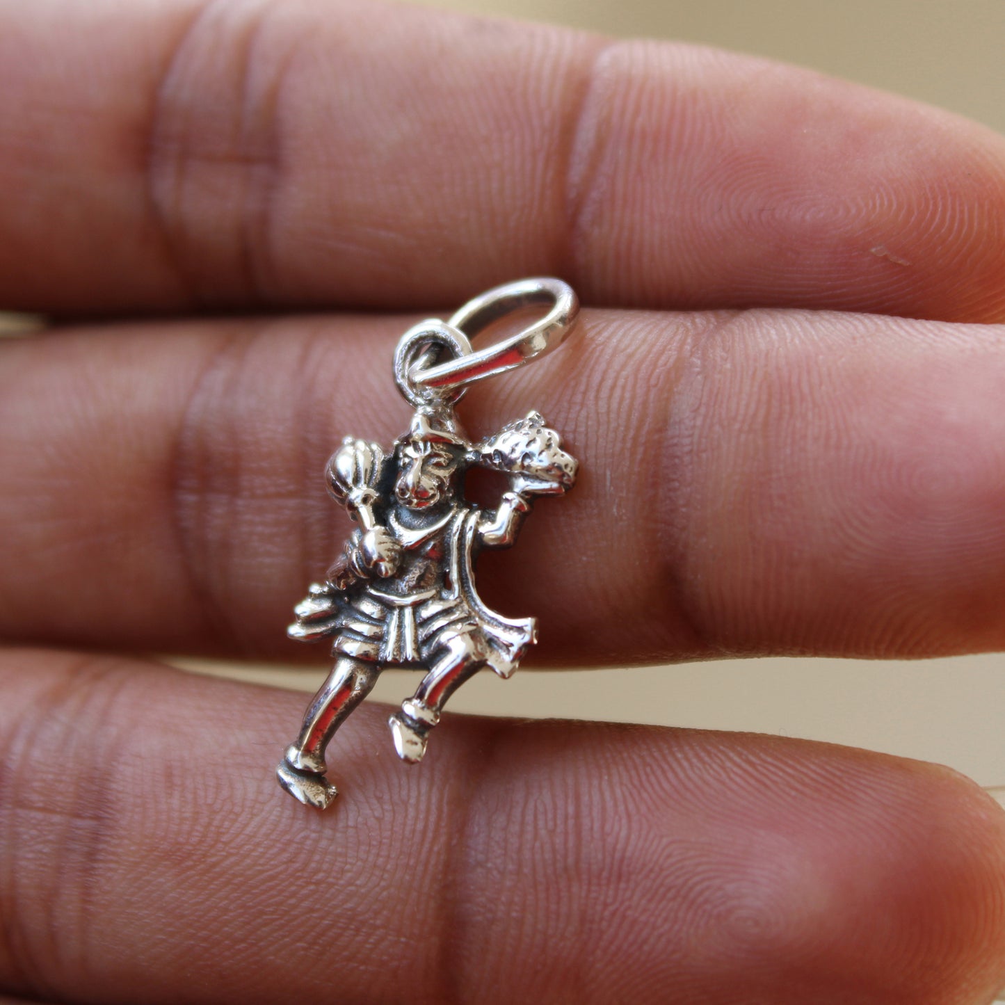 Silver hanuman charm