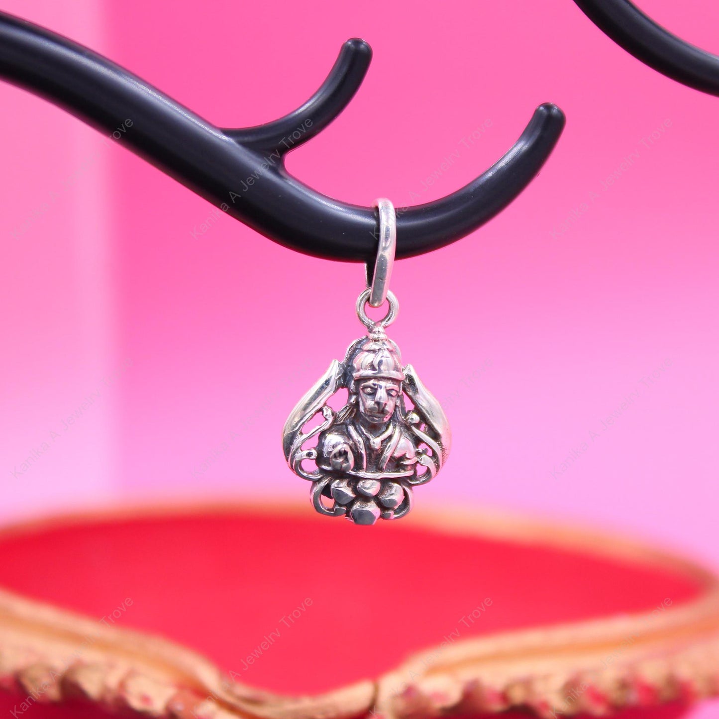 Intricate silver charm with Anjani Putra Hanuman motif