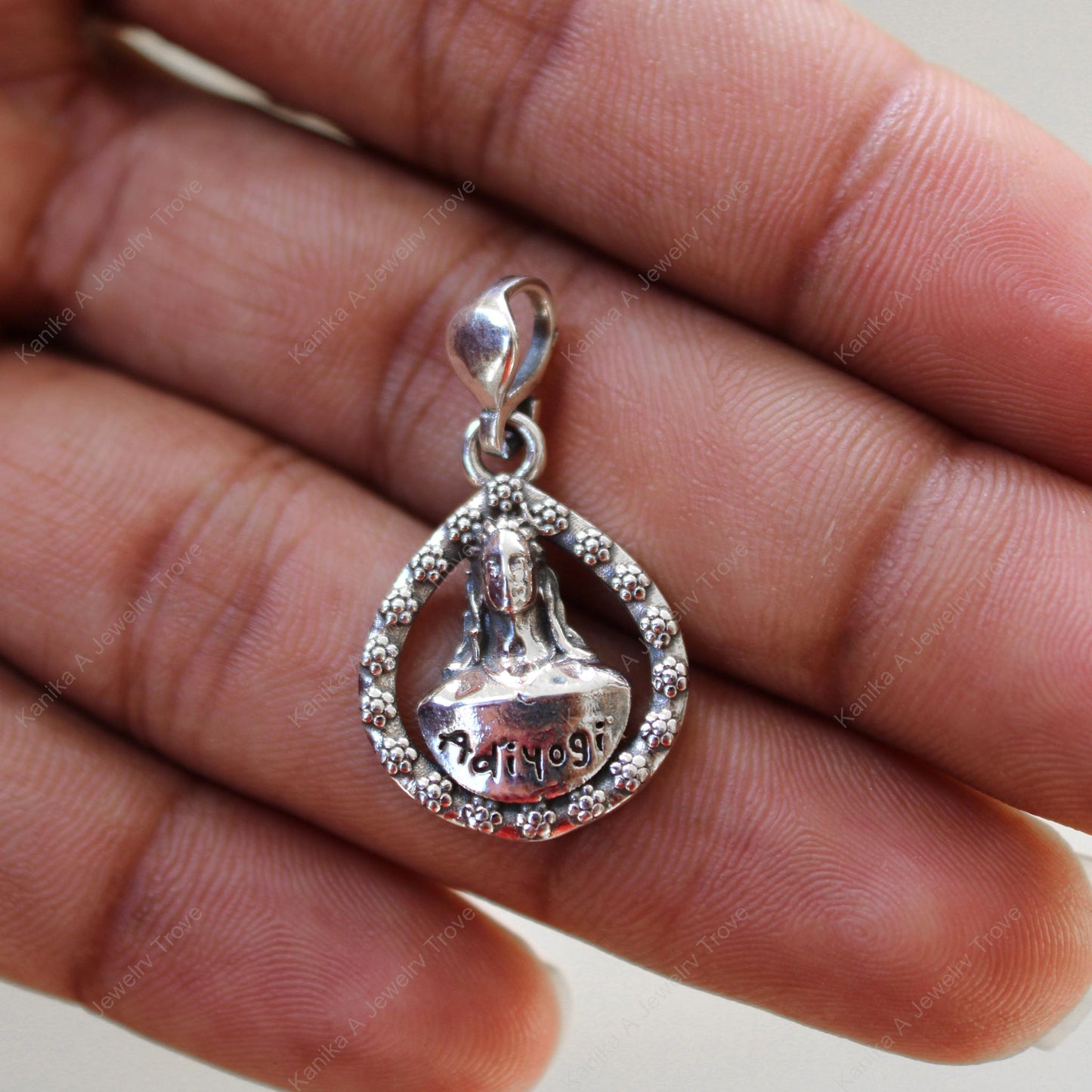 Spiritual silver pendant for wellness and peace