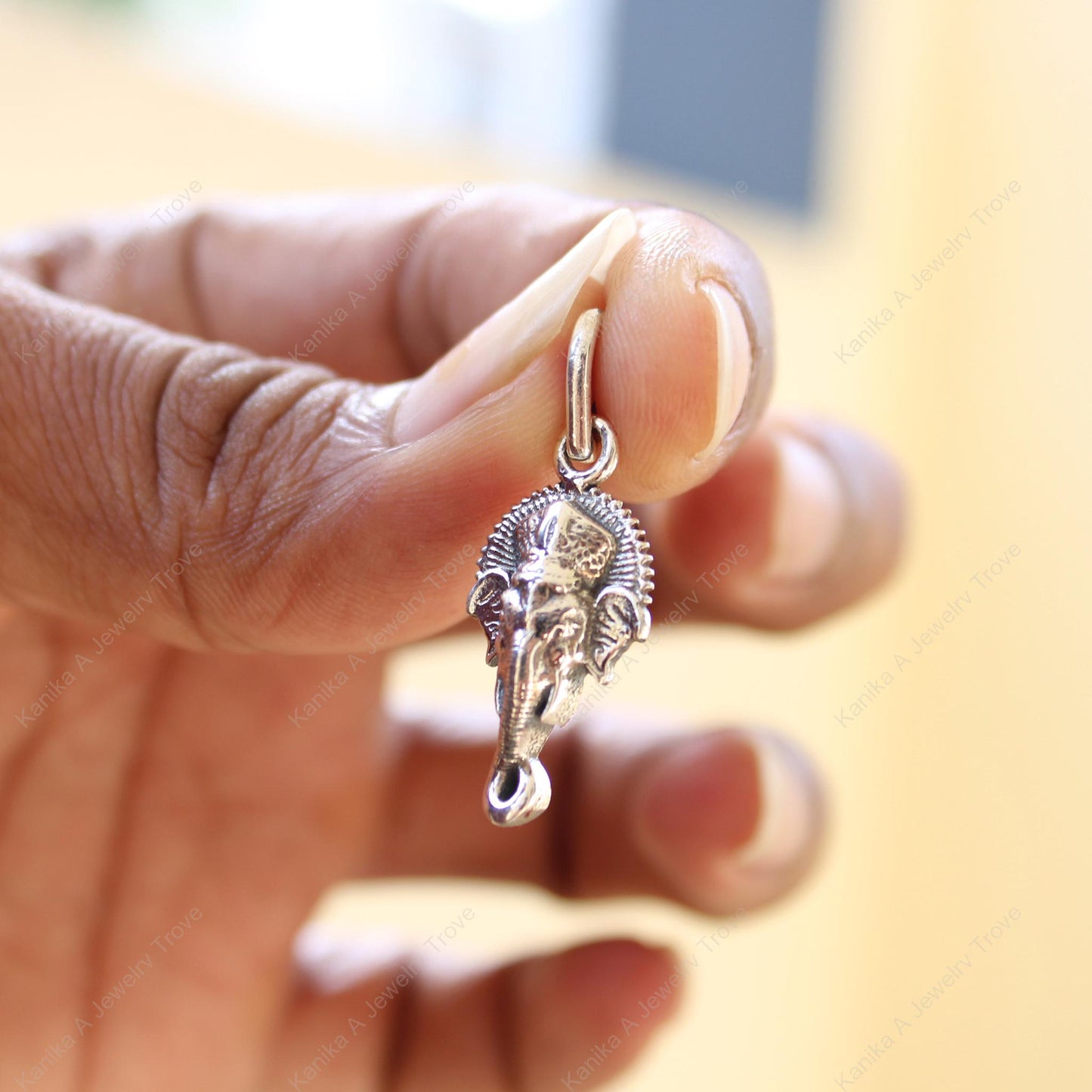 Elegant Ganesh charm on a delicate silver chain